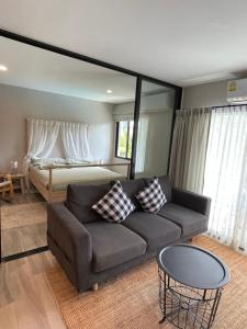 Posezení v ubytování Nai Yang Beach Holiday Rental Apartement - Title Residence
