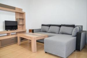 A television and/or entertainment centre at Petra-Mare 8