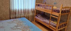 Postel nebo postele na pokoji v ubytování Hasanovs Villa + 37 fotografií