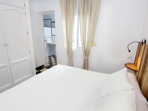 Postel nebo postele na pokoji v ubytování Hotel Finlandia