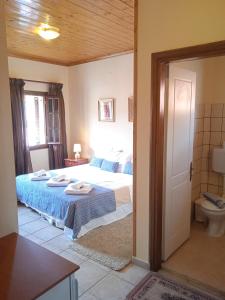 Posteľ alebo postele v izbe v ubytovaní Thiamis Guesthouse