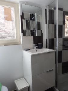 Koupelna v ubytování Le Merlanson chambres d'hôtes
