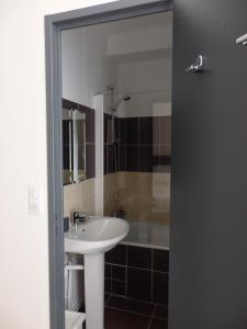 Koupelna v ubytování Le Merlanson chambres d'hôtes + 14 fotografií