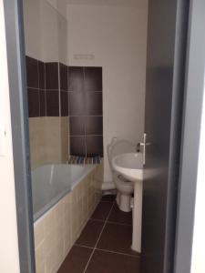 Koupelna v ubytování Le Merlanson chambres d'hôtes