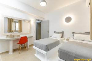 Posteľ alebo postele v izbe v ubytovaní Aphrodite Luxury Apartments