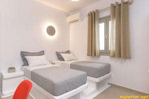 Posteľ alebo postele v izbe v ubytovaní Aphrodite Luxury Apartments