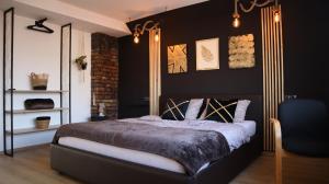 Postel nebo postele na pokoji v ubytování Gondola Apartment