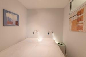 Posteľ alebo postele v izbe v ubytovaní Haus Medemsand Medemsand 219