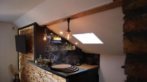Kuchyň nebo kuchyňský kout v ubytování Gondola Apartment