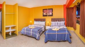 Ένα ή περισσότερα κρεβάτια σε δωμάτιο στο Hotel Royal +2 φωτογραφίες