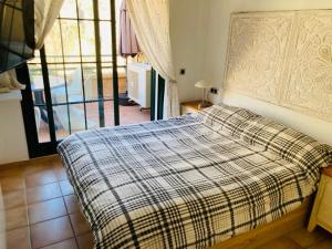 Postel nebo postele na pokoji v ubytování Altea Mascarat playa + 14 fotografií
