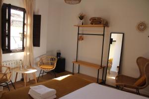 Postel nebo postele na pokoji v ubytování La Piquera Hostal