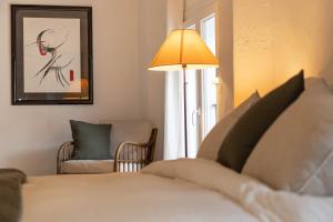 Posteľ alebo postele v izbe v ubytovaní Mougins Collection - Maisonnette Authentique - Vieux Village de Mougins