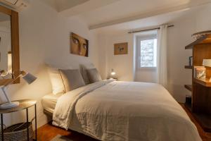 Posteľ alebo postele v izbe v ubytovaní Mougins Collection - Maisonnette Authentique - Vieux Village de Mougins