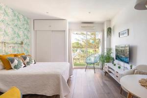 Posteľ alebo postele v izbe v ubytovaní New Studio Júpiter Benalmádena Pools Views