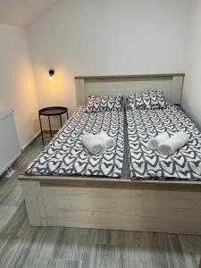 Krevet ili kreveti u jedinici u okviru objekta Aster Apartments