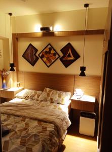 Een bed of bedden in een kamer bij Joey' Condo Place