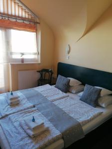 Posteľ alebo postele v izbe v ubytovaní Bianco