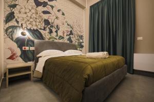 Postel nebo postele na pokoji v ubytování Brettia Guest Rooms