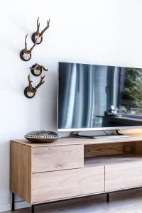 TV a/nebo společenská místnost v ubytování Alpenoase