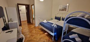 Postel nebo postele na pokoji v ubytování Napol-In