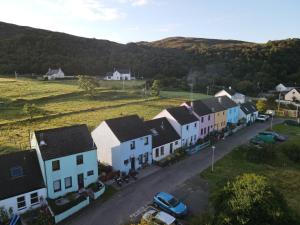 an aerial view of a village with houses and a street at Creag Dubh Bed & Breakfast in Kyle of Lochalsh