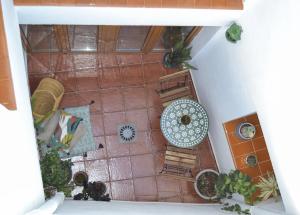 an overhead view of a living room with plants at Casa típica y terraza, maison andalouse, typical house with rooftop in Almuñécar