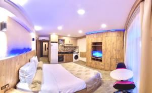 Η κουζίνα ή μικρή κουζίνα στο NOUR SUITE & RESIDENCE