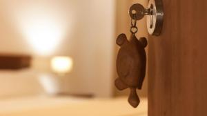 Cama ou camas em um quarto em Hotel Central Santa Maria