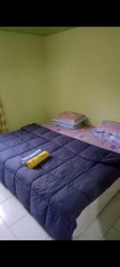 Ένα ή περισσότερα κρεβάτια σε δωμάτιο στο MAK Homstay Downstairs