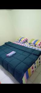 Postel nebo postele na pokoji v ubytování MAK Homstay Downstairs