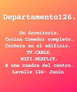 una parola bianca su sfondo rosa di Departamento126 a Junín