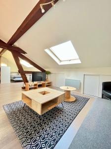 Televízia a/alebo spoločenská miestnosť v ubytovaní Pin's - Magnifique appartement