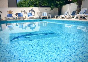 Bazén v ubytování Motel Cap Sol nebo v jeho okolí