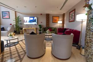 TV a/nebo společenská místnost v ubytování Najm aris hotel
