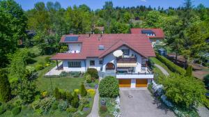 an aerial view of a house with a red roof at Landhaus Christina in Bad Dürrheim