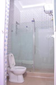 Kylpyhuone majoituspaikassa Akure Airport Hotel
