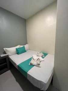 Postel nebo postele na pokoji v ubytování Laule'a Hostel