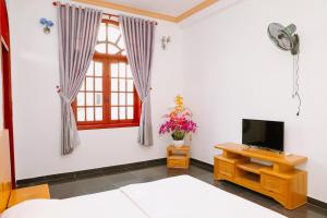 TV/trung tâm giải trí tại Gold Star Relax Villa