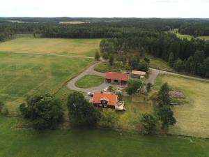 an aerial view of a house in a field at Äppelgården in Sollebrunn