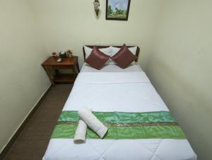 Postel nebo postele na pokoji v ubytování Reach Kunthea Guesthouse + 15 fotografií