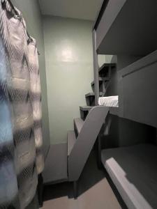 Postel nebo postele na pokoji v ubytování Laule'a Hostel