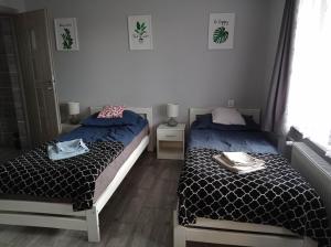 Dom Gościnny "Zawiśle"客房内的一张或多张床位
