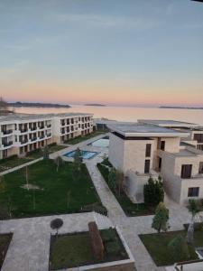 an aerial view of a building with a resort at Апартамент Аполония А3 ап.502 in Sozopol