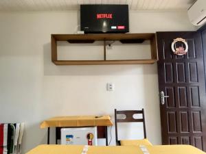 TV tai viihdekeskus majoituspaikassa Pousada Aventura