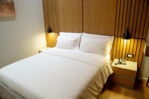 Postel nebo postele na pokoji v ubytování Tree Hotel