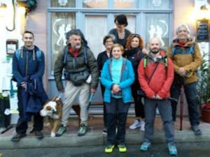 a group of people standing in front of a building at La vita e bella in Saint-Jean-Pied-de-Port