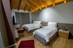 Postel nebo postele na pokoji v ubytování Tree Hotel