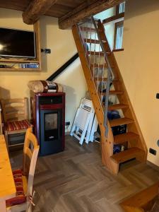 A television and/or entertainment centre at Grandze du Pleiney