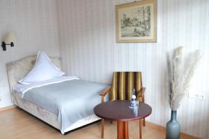 Postel nebo postele na pokoji v ubytování Hotel Harzer am Kurpark